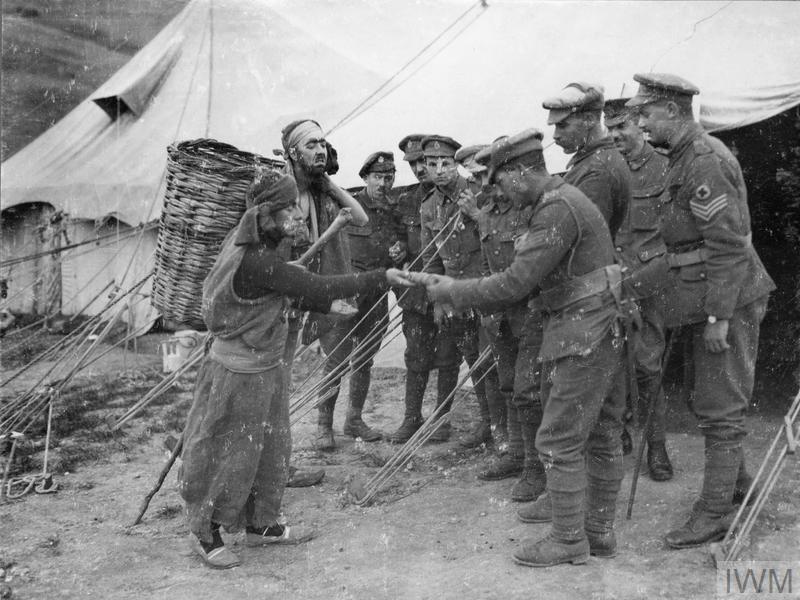 Photo from the IWM Online Collection: Private Oscar Bunyard 316 and Private A. Skinner, both of the Royal Army Medical Corps, dressed as Greek pedlars while producing a pantomime for the troops in Salonika, 19 May 1917 (IWM Q 54735).